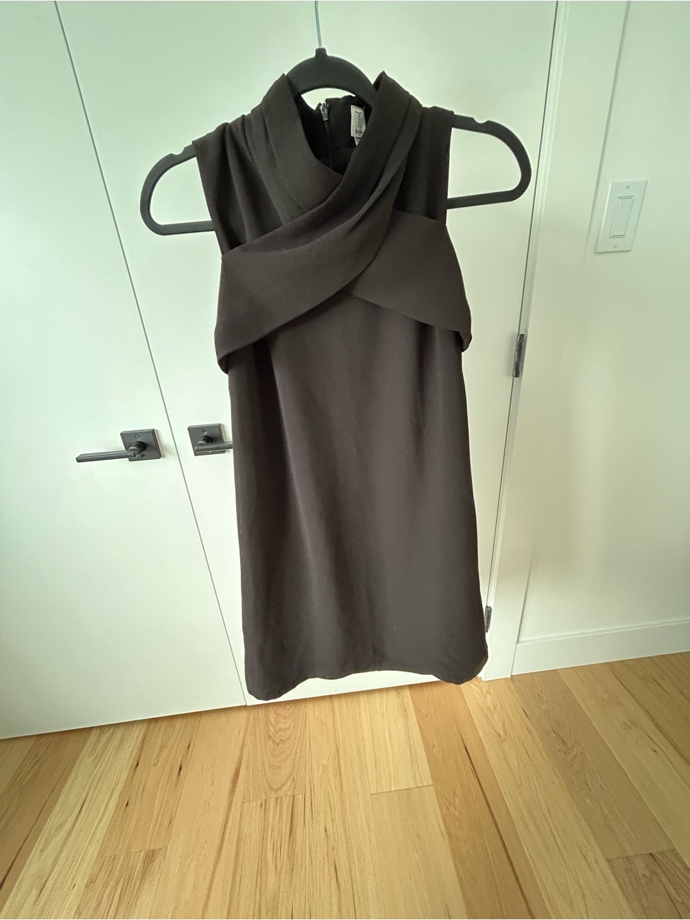 Tristan Sleeveless Cross-Front Mini Dress in Black